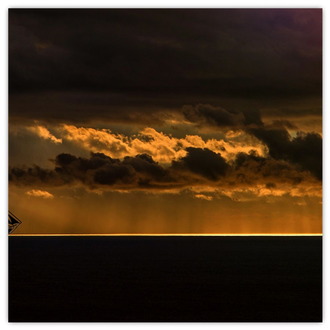 Skleněný obraz plachetnice v západu slunce (V020489V3030GD)